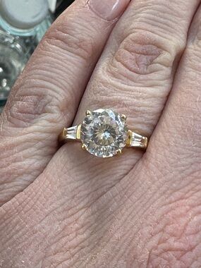 Statement Solitaire ring gold toned CZ baguette sides engagement style ring
